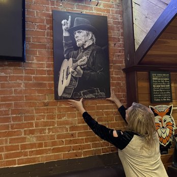 The Red Brick Tavern - Merle Haggard - Raising a Hand for Rett artwork at The Red Brick Tavern - Breakfast & Brunch Near Me - Conroe, Texas The Red Brick Tavern - Merle Haggard - Raising a Hand for Rett artwork at The Red Brick Tavern - Breakfast & Brunch Near Me - Conroe, Texas