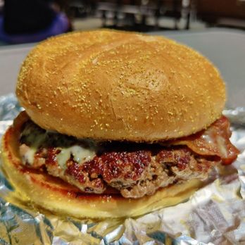 Cosmic Carry Out - a burger with meat and cheese - Food Trucks Near Me - Sylva, North Carolina