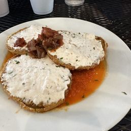 Fried Green Tomatoes with the most delicious cream cheese mousse on top.