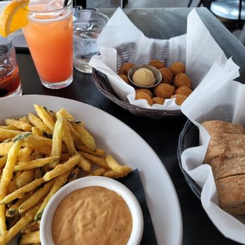 Red Fish Grill - Zucchini fries, jalapeño hush puppies, bread - Seafood Near Me - Morehead City, North Carolina