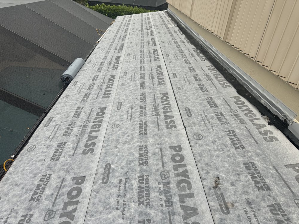 Slide of On Point Roofing