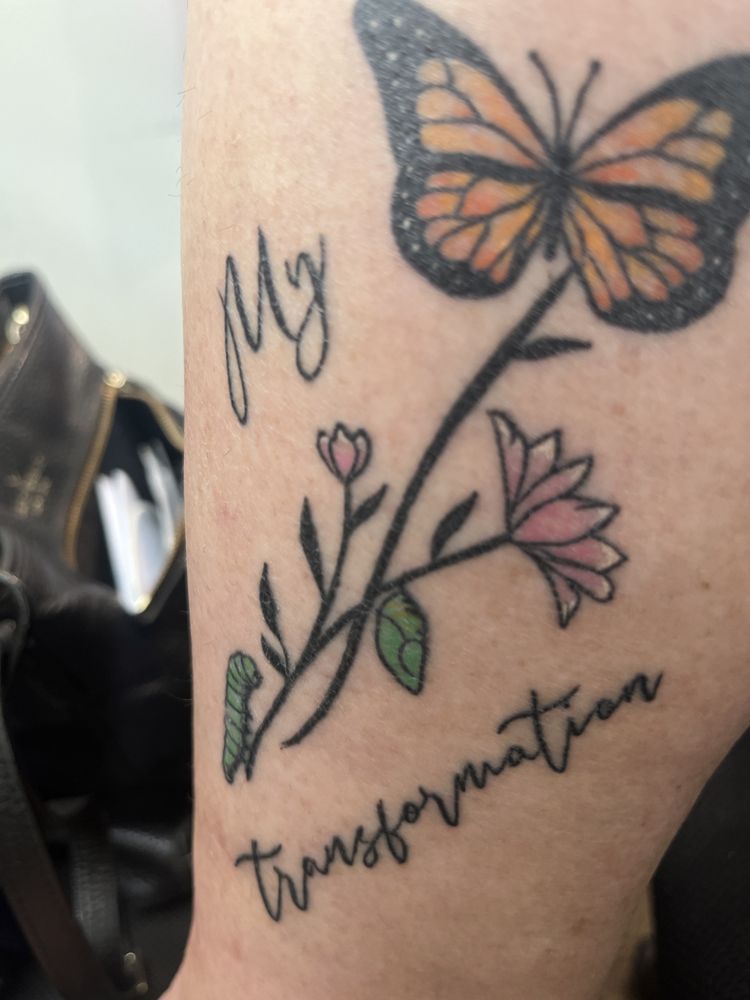 A Clockwork Tattoo and Art Gallery Logo