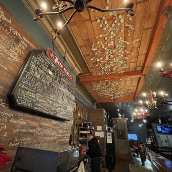 Whit Wort Brewing - Inside. How the heck does anyone get a dollar to stick way up there? - Breweries Near Me - Gibbon, Minnesota Whit Wort Brewing - Inside. How the heck does anyone get a dollar to stick way up there? - Breweries Near Me - Gibbon, Minnesota