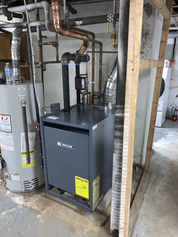 Slide of Service Tech Plumbing Heating &Cooling