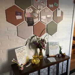 Community bulletin board at Gaia's Daughter Wellness Studio