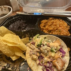 Cantina Laredo - To Go Leftovers for 2nd lunch - Mahi tacos, crispy thin chips, black beans & seasoned rice.