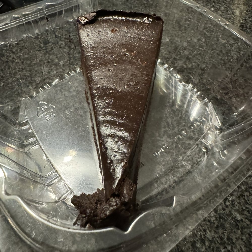 Pizza Novara - Flourless chocolate cake slice - Pizza Near Me - Bloomington, Minnesota Pizza Novara - Flourless chocolate cake slice - Pizza Near Me - Bloomington, Minnesota