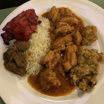 Sahar - From left to right: chicken tandoori, lamb curry, rice, chicken masala, fried fish - Indian Near Me - Wallisellen, ZH