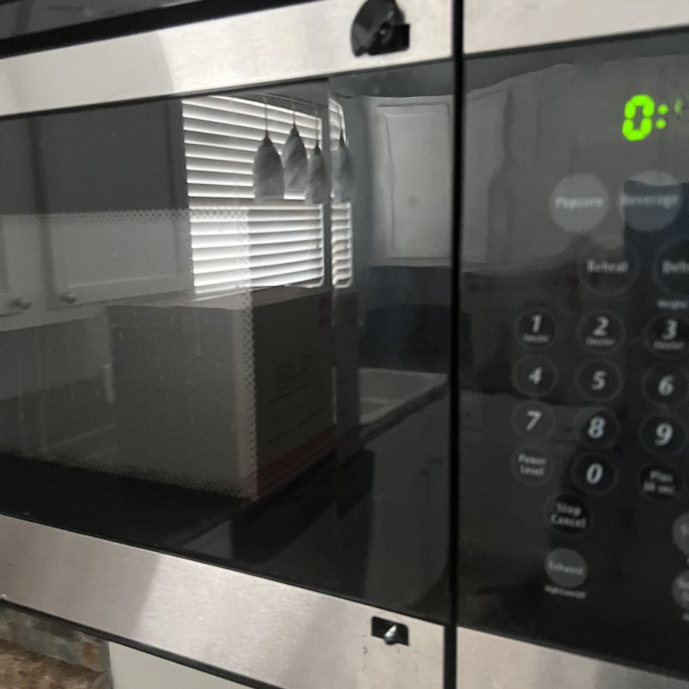 Back Stage Realty - Microwave with sharp screw sticking out where handle is supposed to be attached. - Real Estate Services Near Me - Niceville, Florida Back Stage Realty - Microwave with sharp screw sticking out where handle is supposed to be attached. - Real Estate Services Near Me - Niceville, Florida