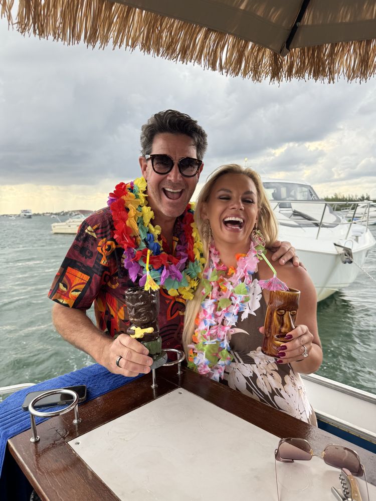 Tiki Cat - Biscayne Boat Rentals Logo