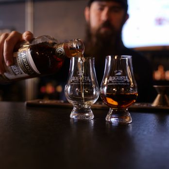 Augusta Distillery - Sit and sip for a while with at the Buckner's Landing craft cocktail bar featuring some rare and hard-to-find pours. - Distilleries Near Me - Augusta, Kentucky Augusta Distillery - Sit and sip for a while with at the Buckner's Landing craft cocktail bar featuring some rare and hard-to-find pours. - Distilleries Near Me - Augusta, Kentucky