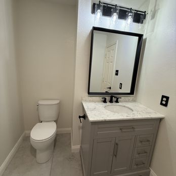 FGM Home Renovations - New vanity, mirror, lights and toilet - Flooring Near Me - Keller, Texas FGM Home Renovations - New vanity, mirror, lights and toilet - Flooring Near Me - Keller, Texas