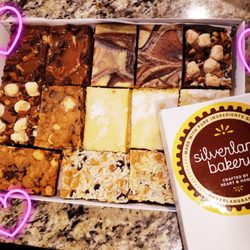 Silverland Bakery - 3 lemon, 2 hopscotch, 2 rocky roads, 2 cow cheesecake, 2 caramel turtles, 2 7 layers bars and 2 happy campers!