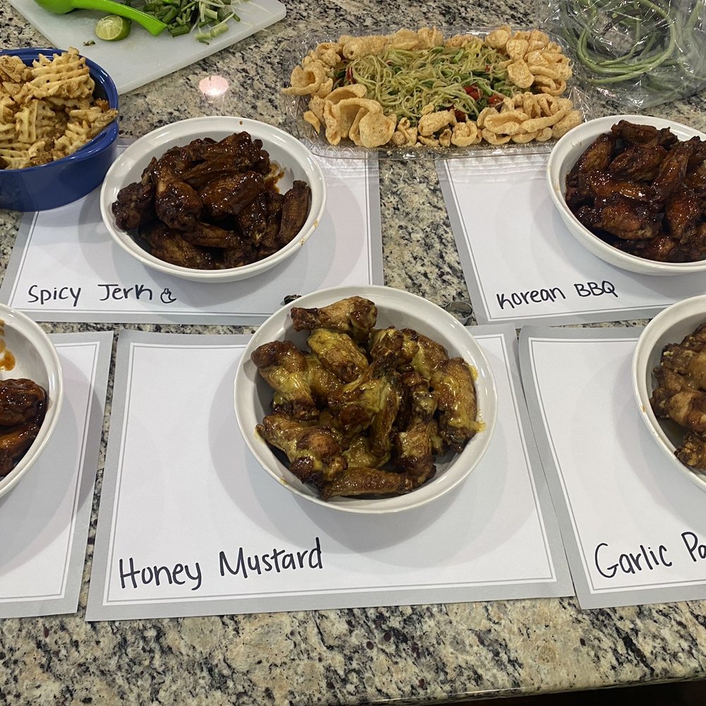 Smokin Wings - a variety of foods on a table - Chicken Wings Near Me - Greenville, South Carolina Smokin Wings - a variety of foods on a table - Chicken Wings Near Me - Greenville, South Carolina