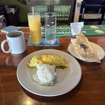 Lulu's Waikiki - Dawn Patrol Omelet ($15.00); coffee ($4.00); and orange juice ($5.00). With $1.14 tax, the ticket total was $25.14 before gratuity. - Burgers Near Me - Honolulu, Hawaii Lulu's Waikiki - Dawn Patrol Omelet ($15.00); coffee ($4.00); and orange juice ($5.00). With $1.14 tax, the ticket total was $25.14 before gratuity. - Burgers Near Me - Honolulu, Hawaii