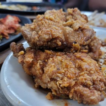 Side Street Inn - what was left of two huge plates of garlic fried chicken. - Sports Bars Near Me - Honolulu, Hawaii Side Street Inn - what was left of two huge plates of garlic fried chicken. - Sports Bars Near Me - Honolulu, Hawaii
