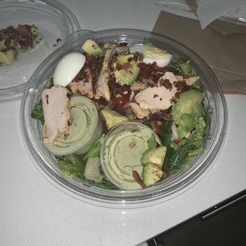 Panera Bread - Had the green cob salad ,. It had chicken strips and red onion, egg and avocado , cherry tomatoes , bacon bits and some kind of dressing . - Salad Near Me - Laurel, Maryland