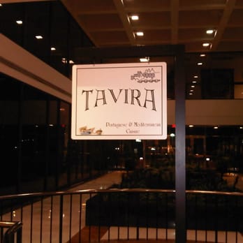 Tavira Restaurant - sign atop the spiral stairs - Mediterranean Near Me - Chevy Chase, Maryland
