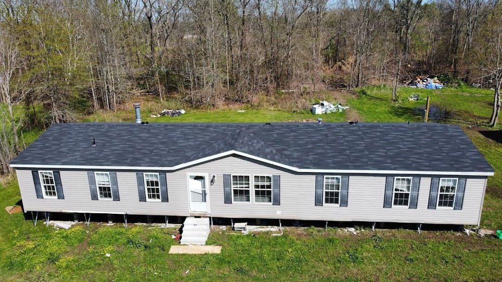 Slide of Flournoy and Sons Roofing