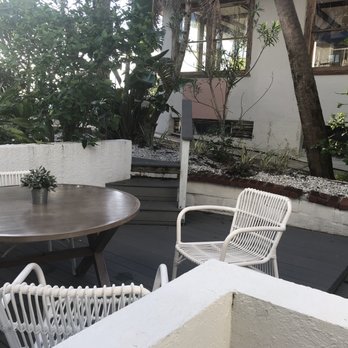 Inn On the Beach - Hibiscus porch area May 2018 - Hotels Near Me - St. Pete Beach, Florida Inn On the Beach - Hibiscus porch area May 2018 - Hotels Near Me - St. Pete Beach, Florida