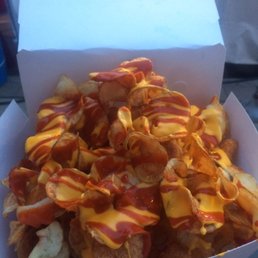 Ribbon fries w/ cheese & hot sauce