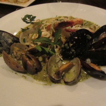 Wence's - Seafood Fettuccine -- Calamari, Prawns, Black Mussels, Manila Clams, Garlic, and Asiago with Creamy Pesto - New American Near Me - Pleasant Hill, California Wence's - Seafood Fettuccine -- Calamari, Prawns, Black Mussels, Manila Clams, Garlic, and Asiago with Creamy Pesto - New American Near Me - Pleasant Hill, California