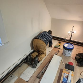 The Fix-it Team - Installing floating floor - Plumbing Near Me The Fix-it Team - Installing floating floor - Plumbing Near Me