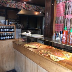 Johnny Pizza - Interior: take out ready, or order.