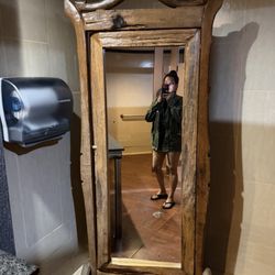 Gorgeous antique stand up mirror in the very clean women's bathrooms