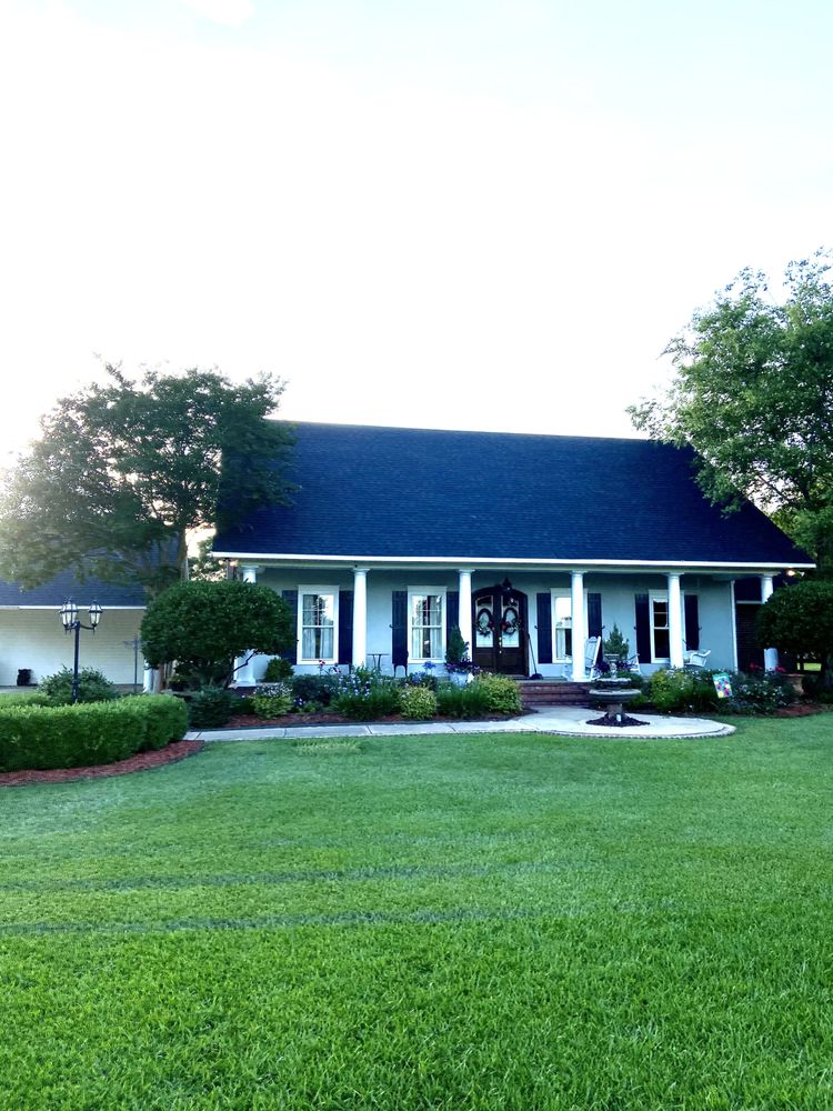 Slide of John Theriots Roofing
