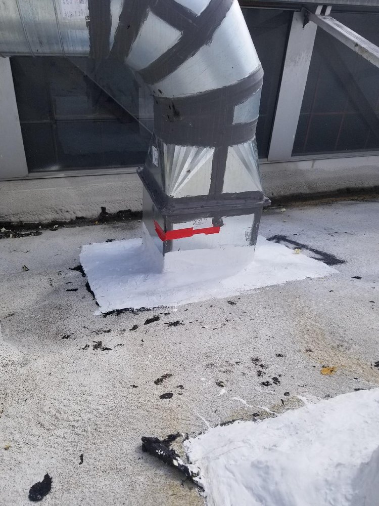 Slide of Huncho Roofer