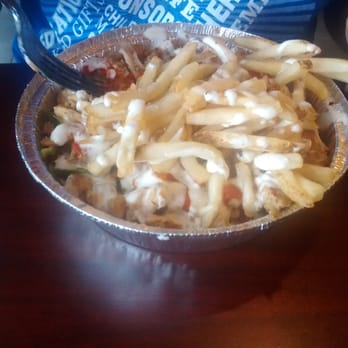 New York Eats - Chicken over Rice with Fries (Extra $.49) - Mediterranean Near Me - Arlington, Texas New York Eats - Chicken over Rice with Fries (Extra $.49) - Mediterranean Near Me - Arlington, Texas