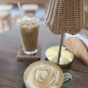 Fly the Flag Coffee - Latte w/Almond milk and an iced latte with hazelnut syrup - Coffee & Tea Near Me - Brownsville, Texas Fly the Flag Coffee - Latte w/Almond milk and an iced latte with hazelnut syrup - Coffee & Tea Near Me - Brownsville, Texas