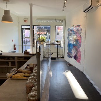 Crumbled - a long counter with jars of food on it - Desserts Near Me - Hamilton, Ontario