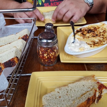 Wild Tomato - Best spinach and artichoke dip ever . Hands down drooling just writing about it! - Pizza Near Me - Fish Creek, Wisconsin Wild Tomato - Best spinach and artichoke dip ever . Hands down drooling just writing about it! - Pizza Near Me - Fish Creek, Wisconsin