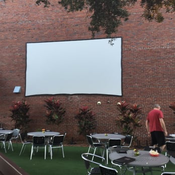 Motorworks Brewing - Movie screen and outdoor seating - Breweries Near Me - Bradenton, Florida