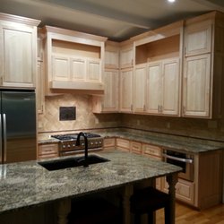 All Task Pro - Ron decided to go with custom maple cabinets with bold granite counter tops. We kept the fridge and upgraded the stove to a dual fuel profes