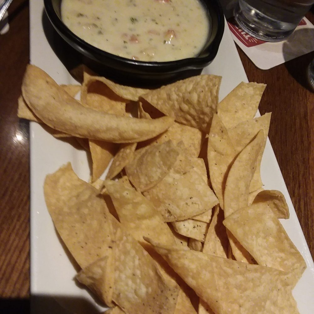Outback Steakhouse - Shrimp scampi dip with tortilla chips - Steakhouses Near Me - Lancaster, Pennsylvania Outback Steakhouse - Shrimp scampi dip with tortilla chips - Steakhouses Near Me - Lancaster, Pennsylvania