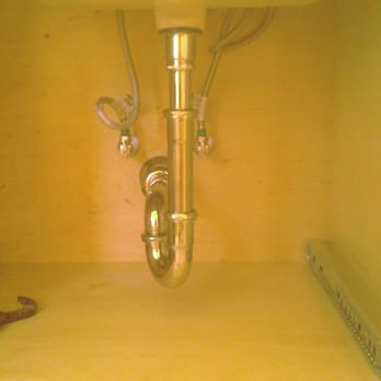 West Home Service - a sink under a cabinet - General Contractors Near Me West Home Service - a sink under a cabinet - General Contractors Near Me