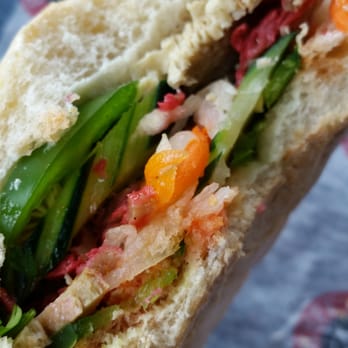 What The Pho - Cross section of a veggie special bahn mi, made vegan by omitting the mayonnaise. Delicious! - Vietnamese Near Me - Indianapolis, Indiana What The Pho - Cross section of a veggie special bahn mi, made vegan by omitting the mayonnaise. Delicious! - Vietnamese Near Me - Indianapolis, Indiana
