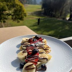 Hilltop Restaurant and Bar - The Sweet Crepe at Hilltop is a delicious mix of fresh berries, bananas, and Nutella wrapped in a warm, fluffy crepe!