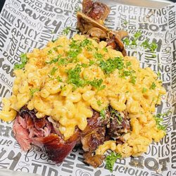 122 Hang Suite - Southern Baked Mac + Cheese stuffed Turkey Leg