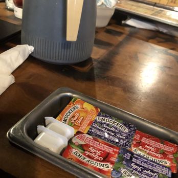 Old West Cafe - The jelly and sweeteners holders were built into the table - Breakfast & Brunch Near Me - Grapevine, Texas Old West Cafe - The jelly and sweeteners holders were built into the table - Breakfast & Brunch Near Me - Grapevine, Texas