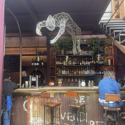 The bar area going towards the bathroom