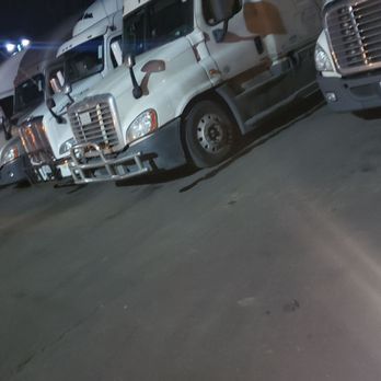 Flying J Travel Center - a row of semi trucks - Gas Stations Near Me - Aurora, Colorado
