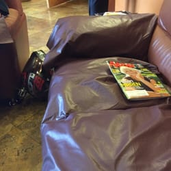 Ahwatukee Primary Care - Apparently throwing fake leather over ripped fake leather is the theme of this waiting room...