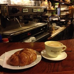 Cafe latte with cacao and a croissant, yum! Cafe latte with cacao and a croissant, yum!