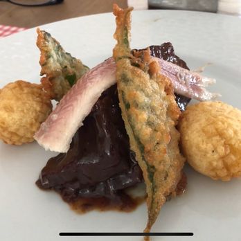 El Merendero de Antonio Martin - Veal cheek with cocoa crunchy 'causa limena' and fried shiso - Spanish Near Me - Málaga, Massachusetts El Merendero de Antonio Martin - Veal cheek with cocoa crunchy 'causa limena' and fried shiso - Spanish Near Me - Málaga, Massachusetts