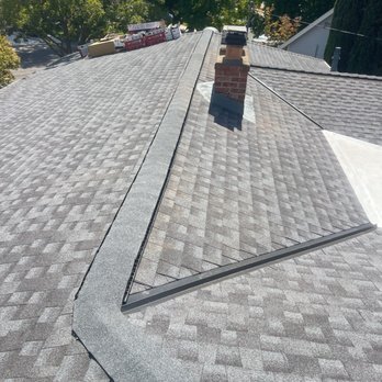 Sacramento Roofing - ridge line and chimney diverter flashing - Roofing Near Me