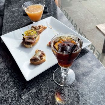 Ogi Deli - Two Basque cocktails - Basque martini and a Picón with sandwiches - tri-tip, basque chorizo, and horseradish beef. - Delis Near Me - Elko, Nevada